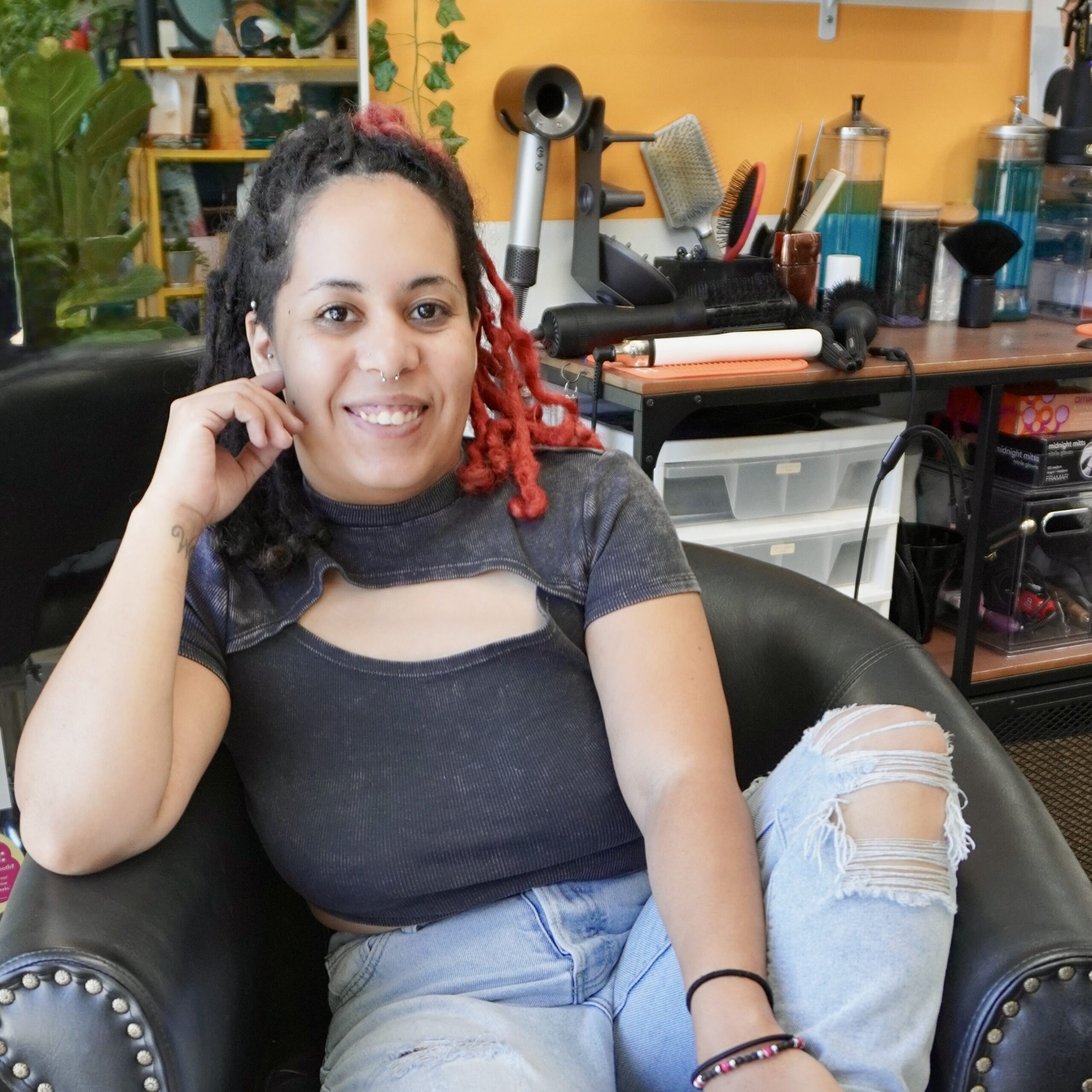 Luci, stylist at Keenan Salon in Atlanta, specializing in vivid haircolor and personalized color transformations.