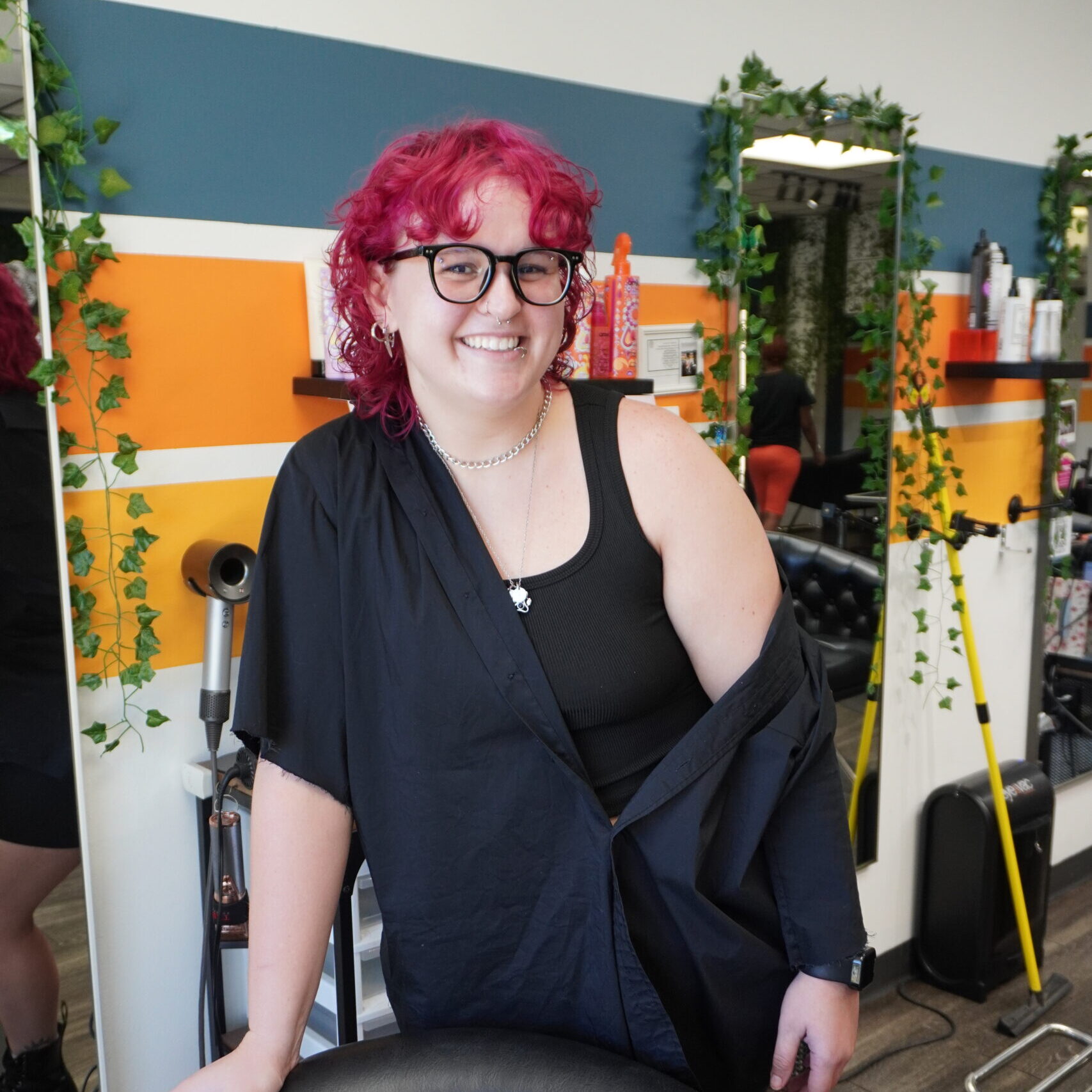 Luci, stylist at Keenan Salon in Atlanta, specializing in vivid haircolor and personalized color transformations.