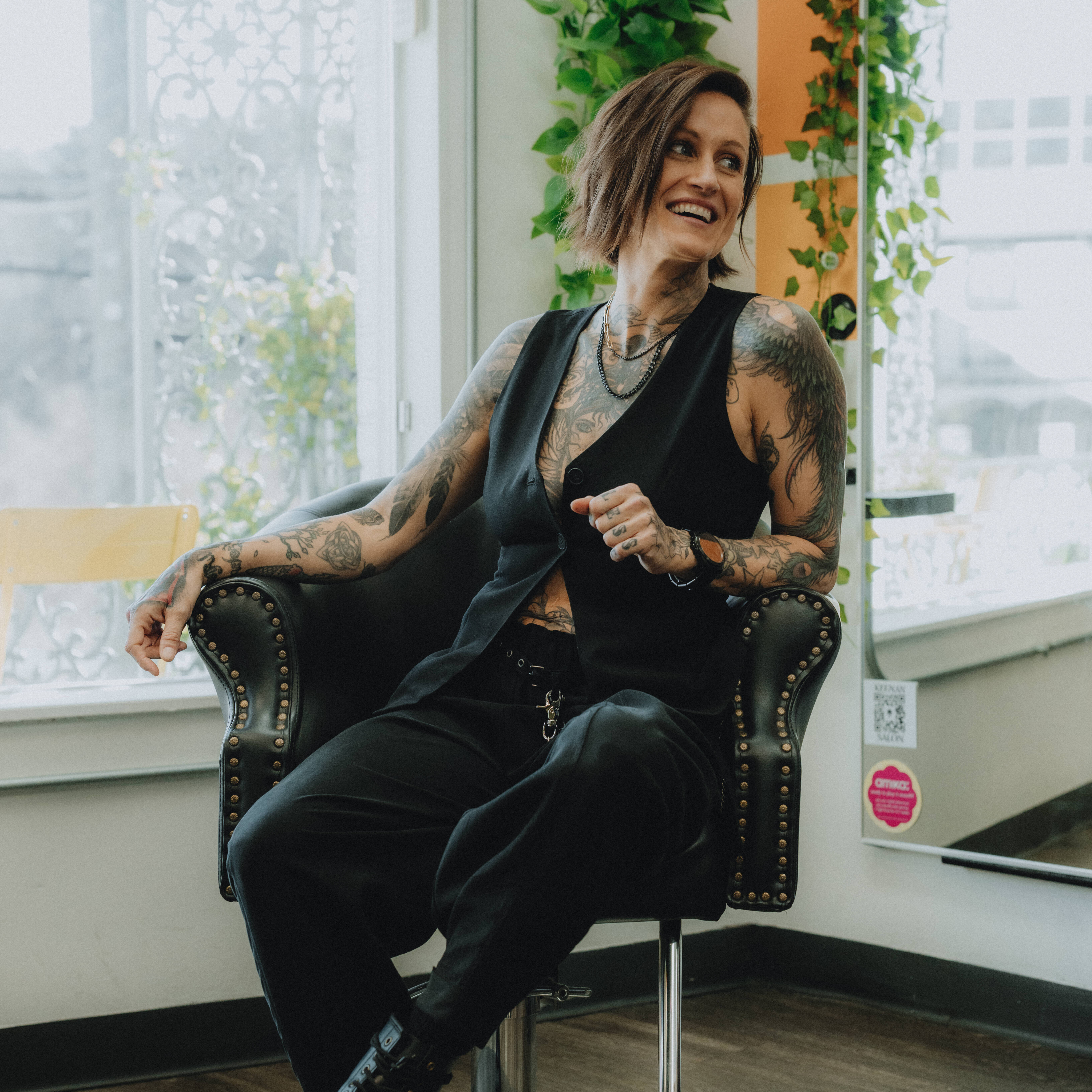 Keenan, owner and stylist at Keenan Salon in Atlanta, specializing in pixie cuts, textured haircuts, and Itip extensions.