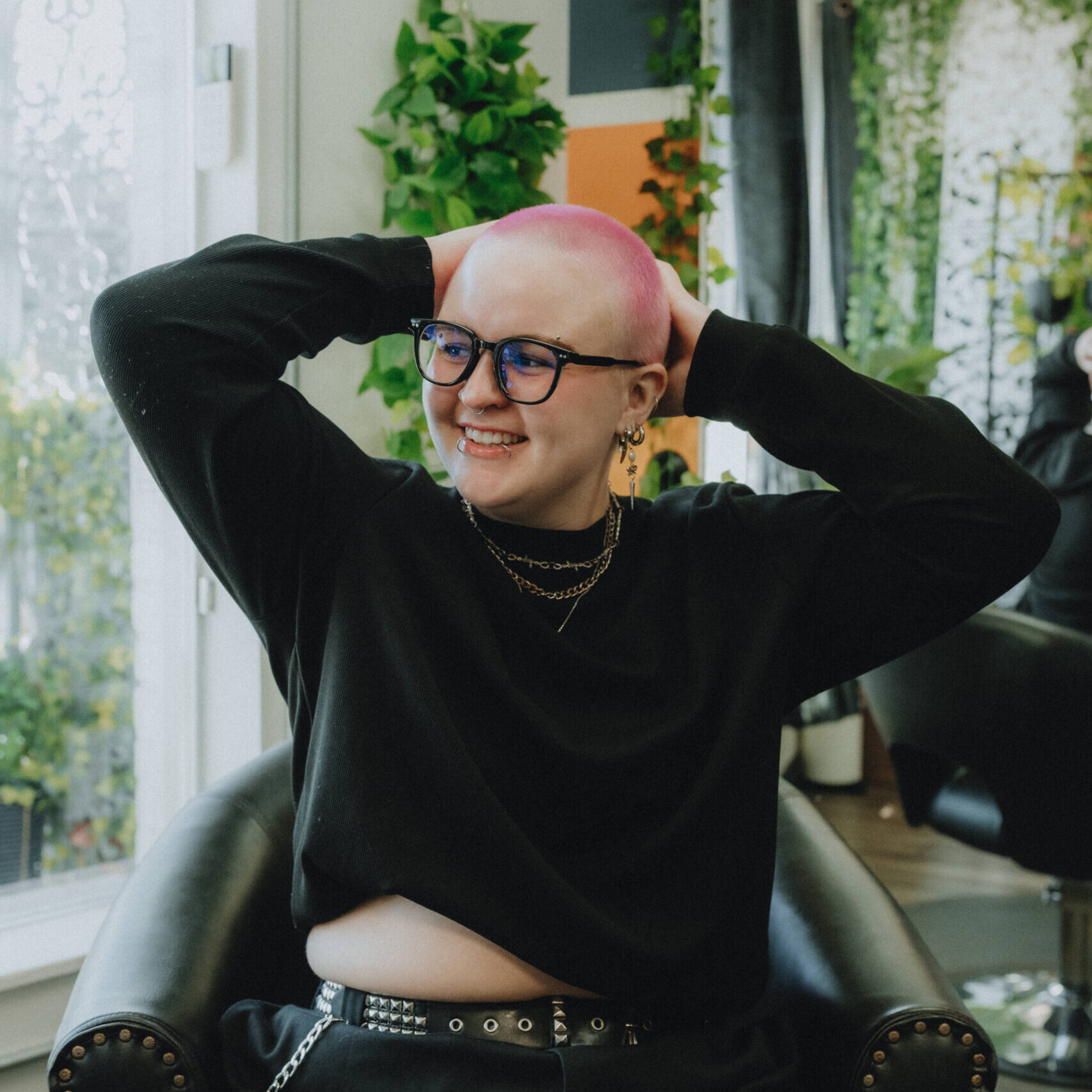 Luci, stylist at Keenan Salon in Atlanta, specializing in vivid haircolor and personalized color transformations.