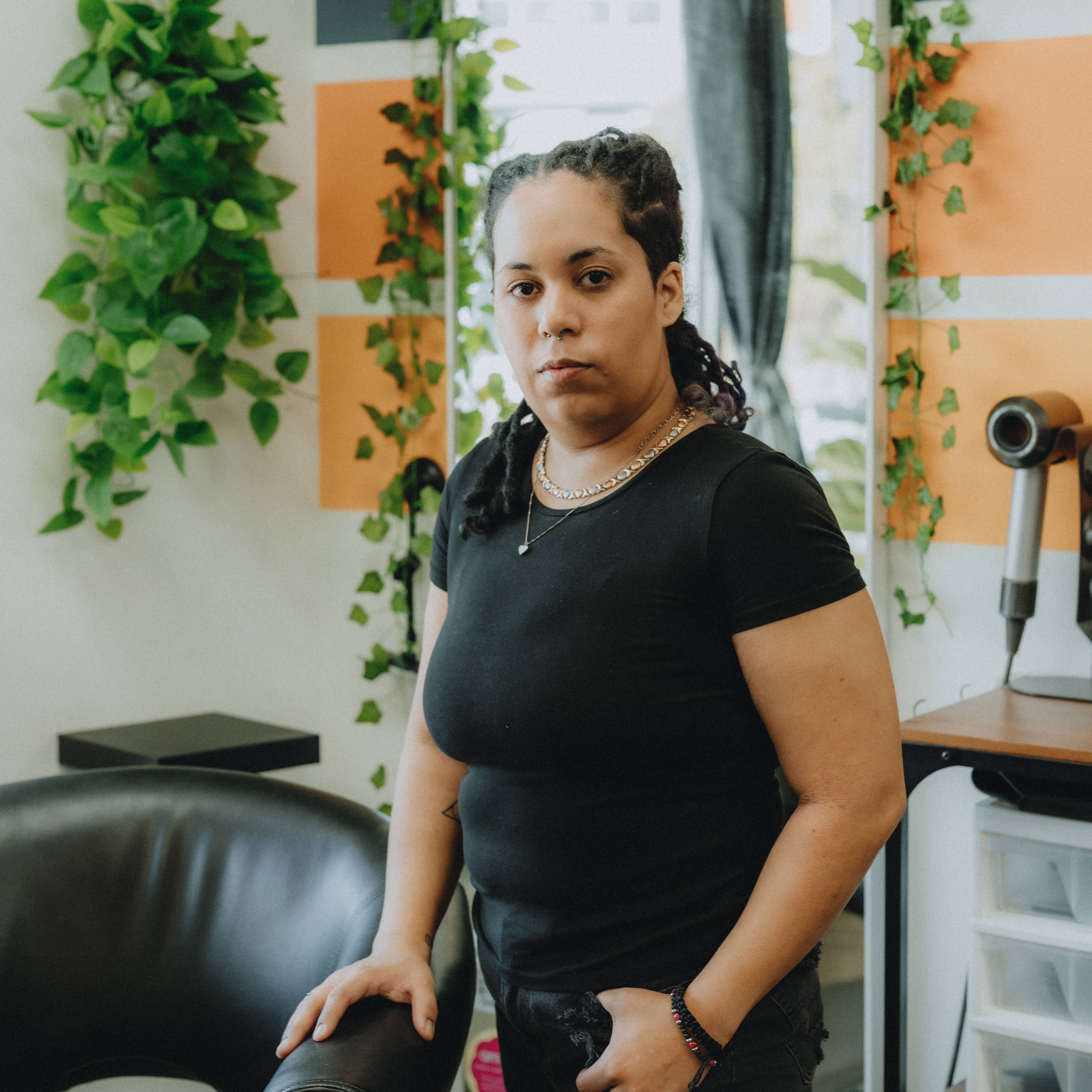 Luci, stylist at Keenan Salon in Atlanta, specializing in vivid haircolor and personalized color transformations.