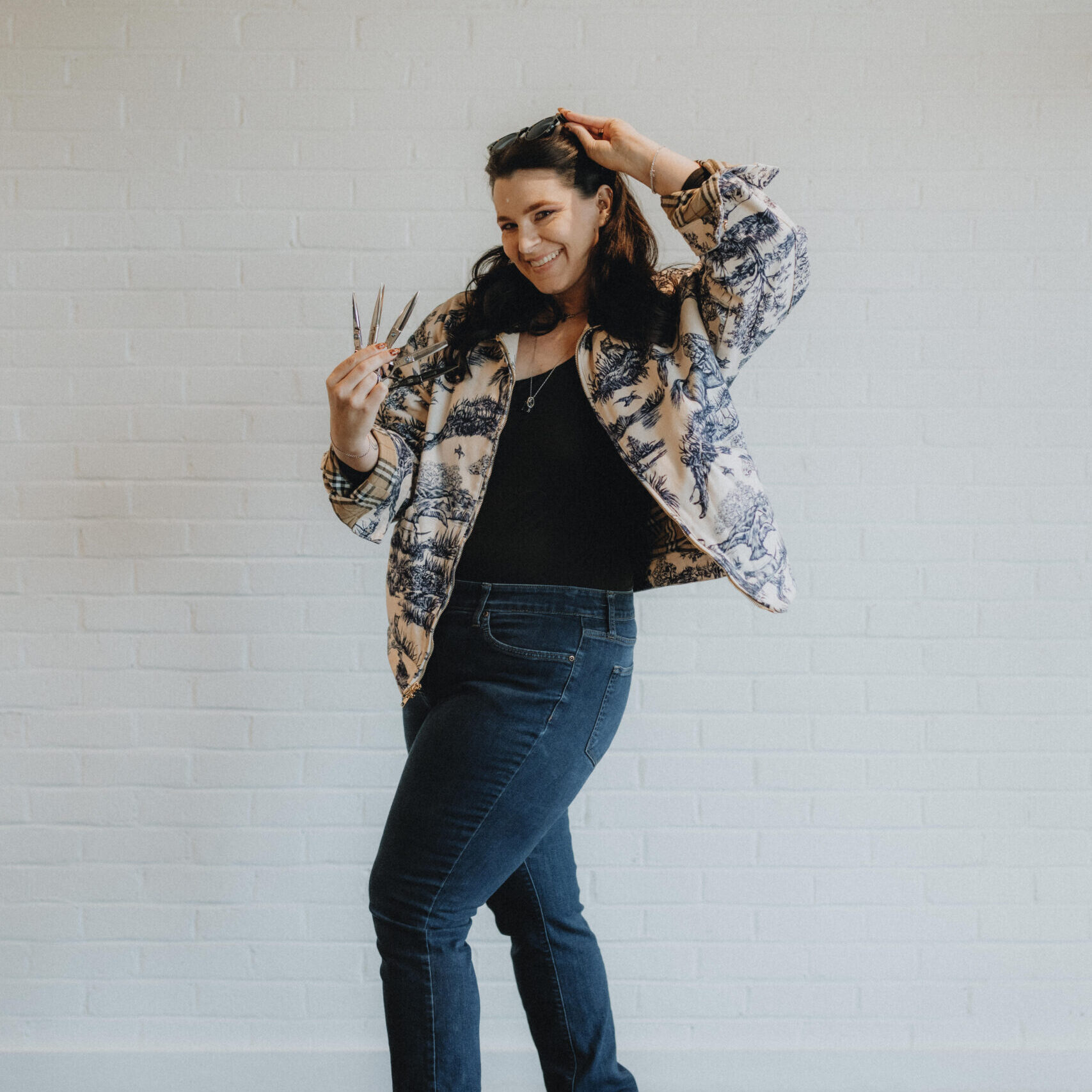 Rachel, stylist at Keenan Salon in Atlanta, specializing in creative haircuts, vivid haircolor, and formal styling.