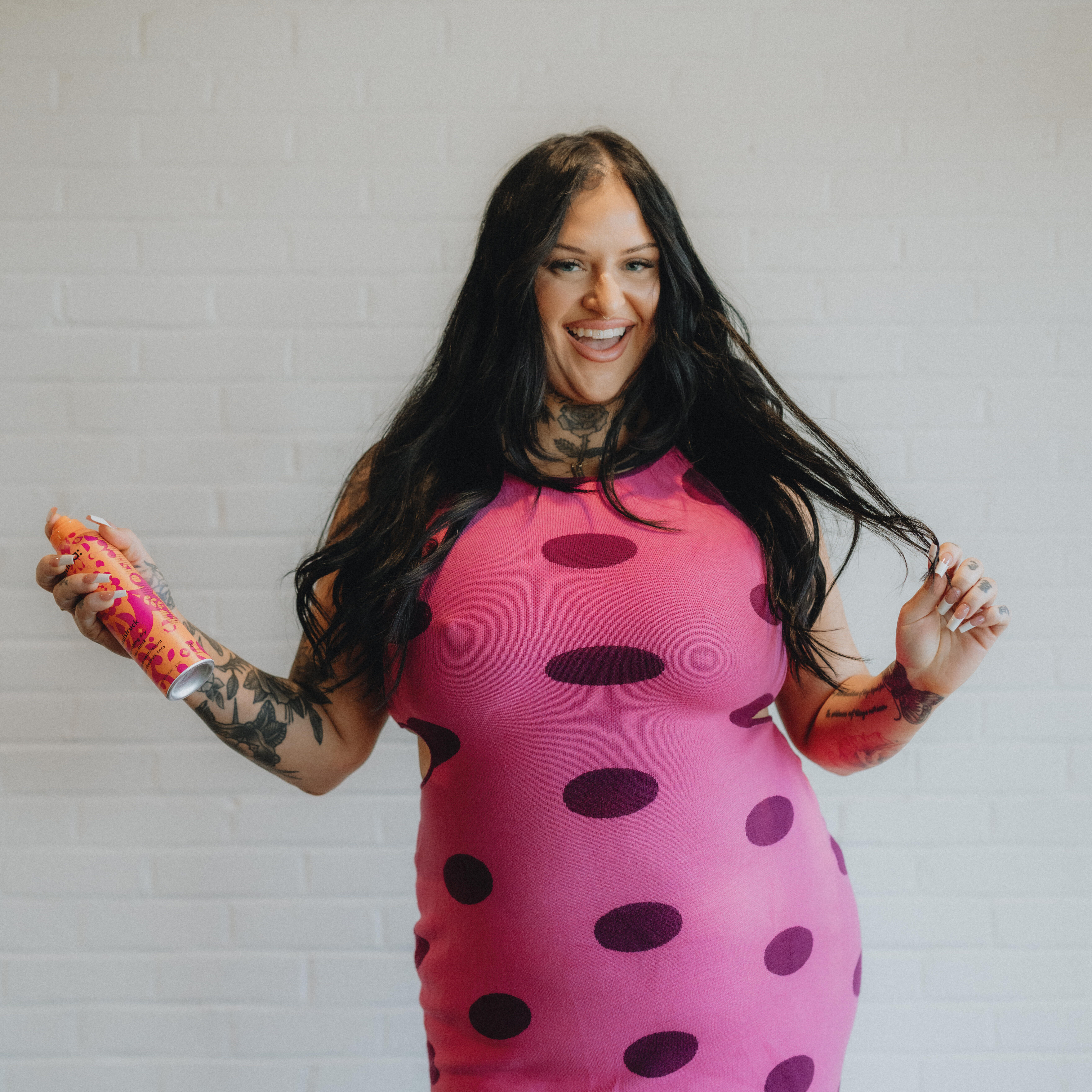 Dany, stylist at Keenan Salon in Atlanta, specializing in extensions, blonding, and lived-in hair color.