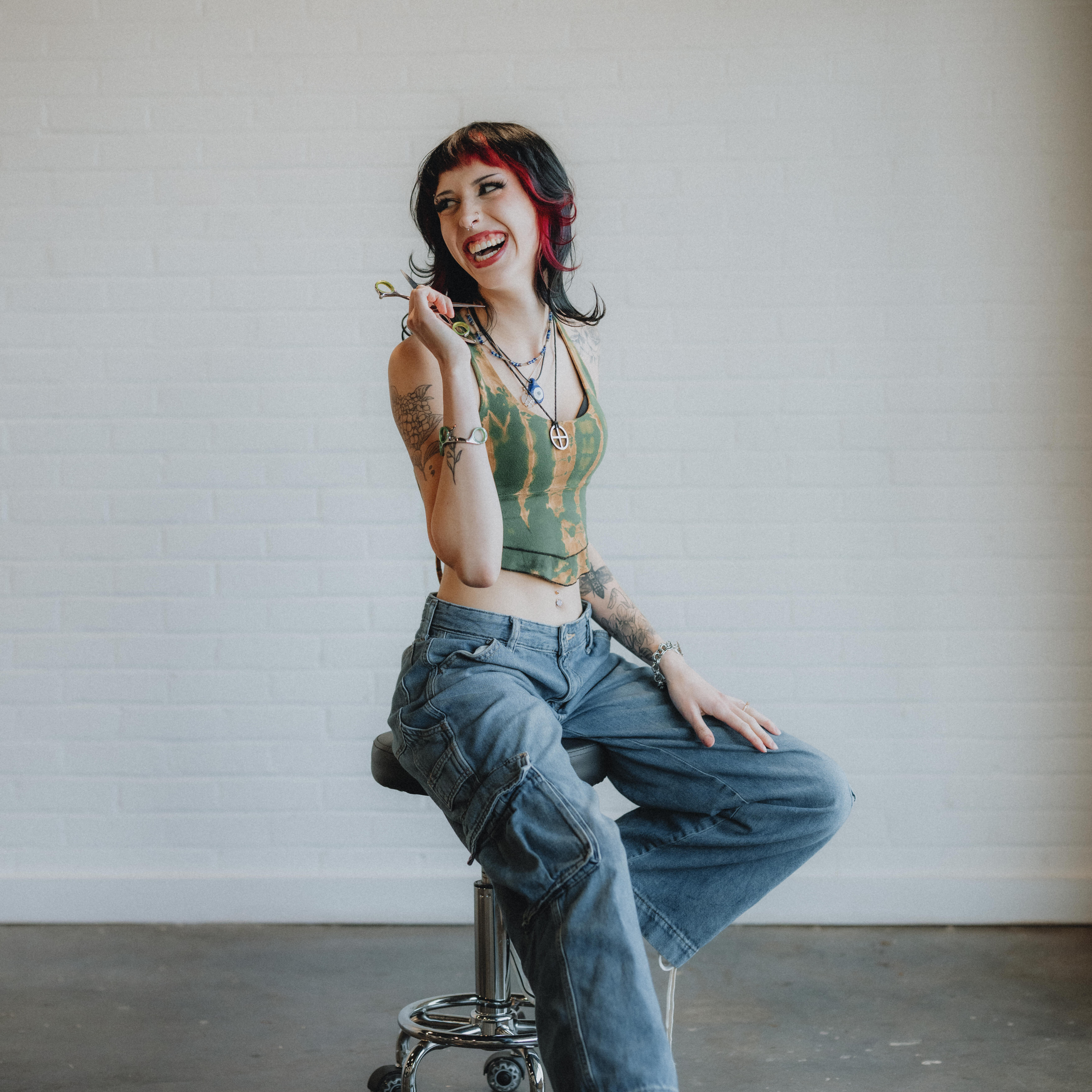 Rachel, stylist at Keenan Salon in Atlanta, specializing in creative haircuts, vivid haircolor, and formal styling.