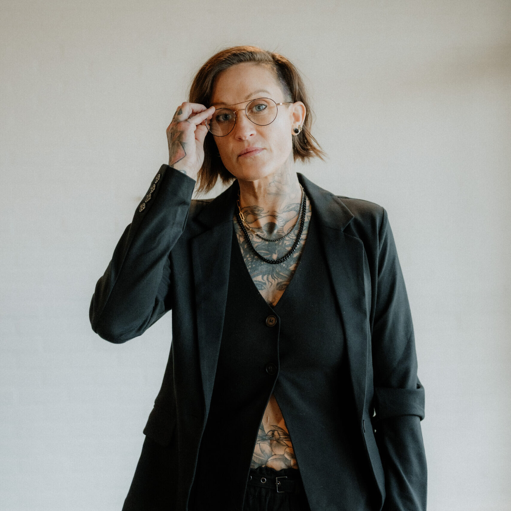 Keenan, owner and stylist at Keenan Salon in Atlanta, specializing in pixie cuts, textured haircuts, and Itip extensions.