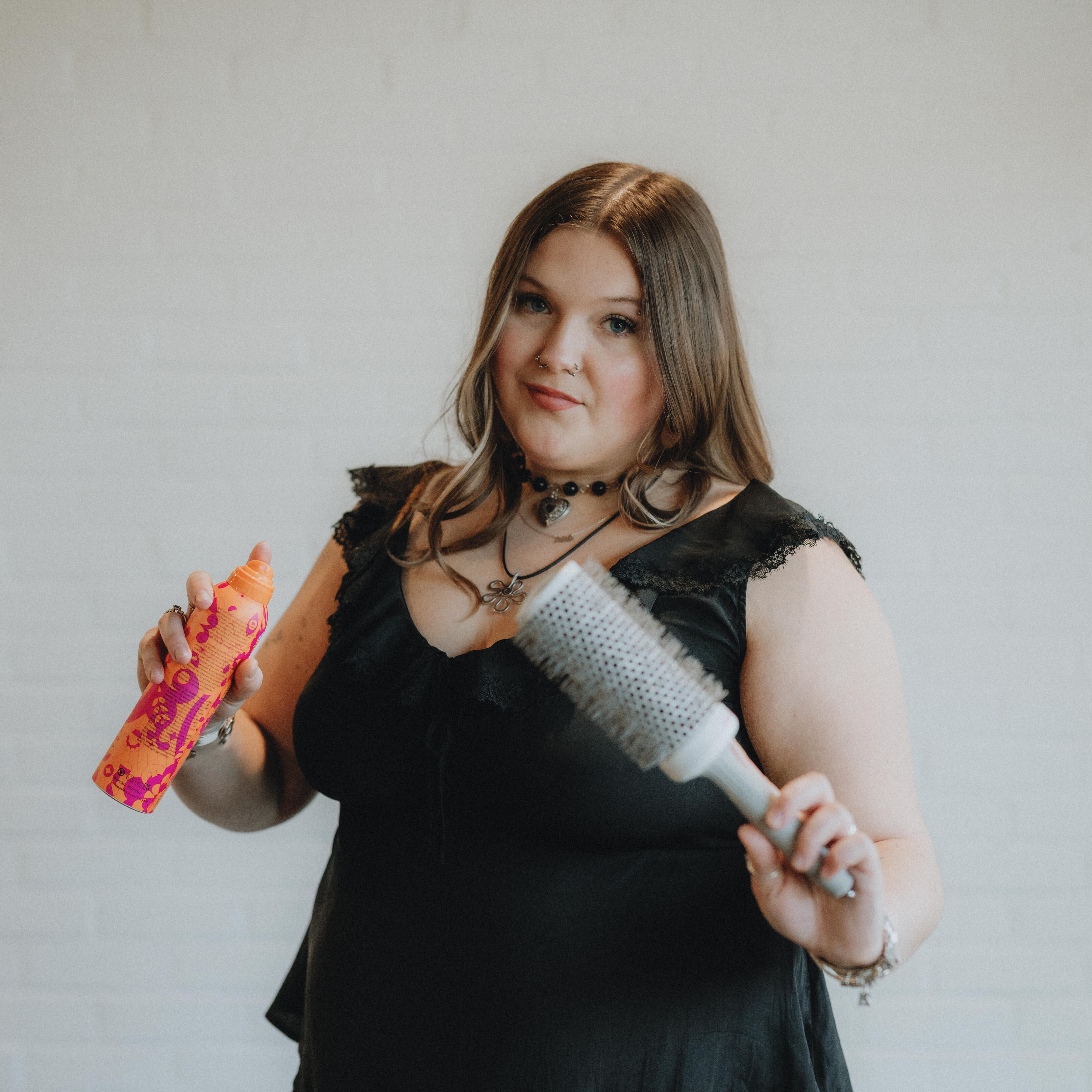 Luci, stylist at Keenan Salon in Atlanta, specializing in vivid haircolor and personalized color transformations.
