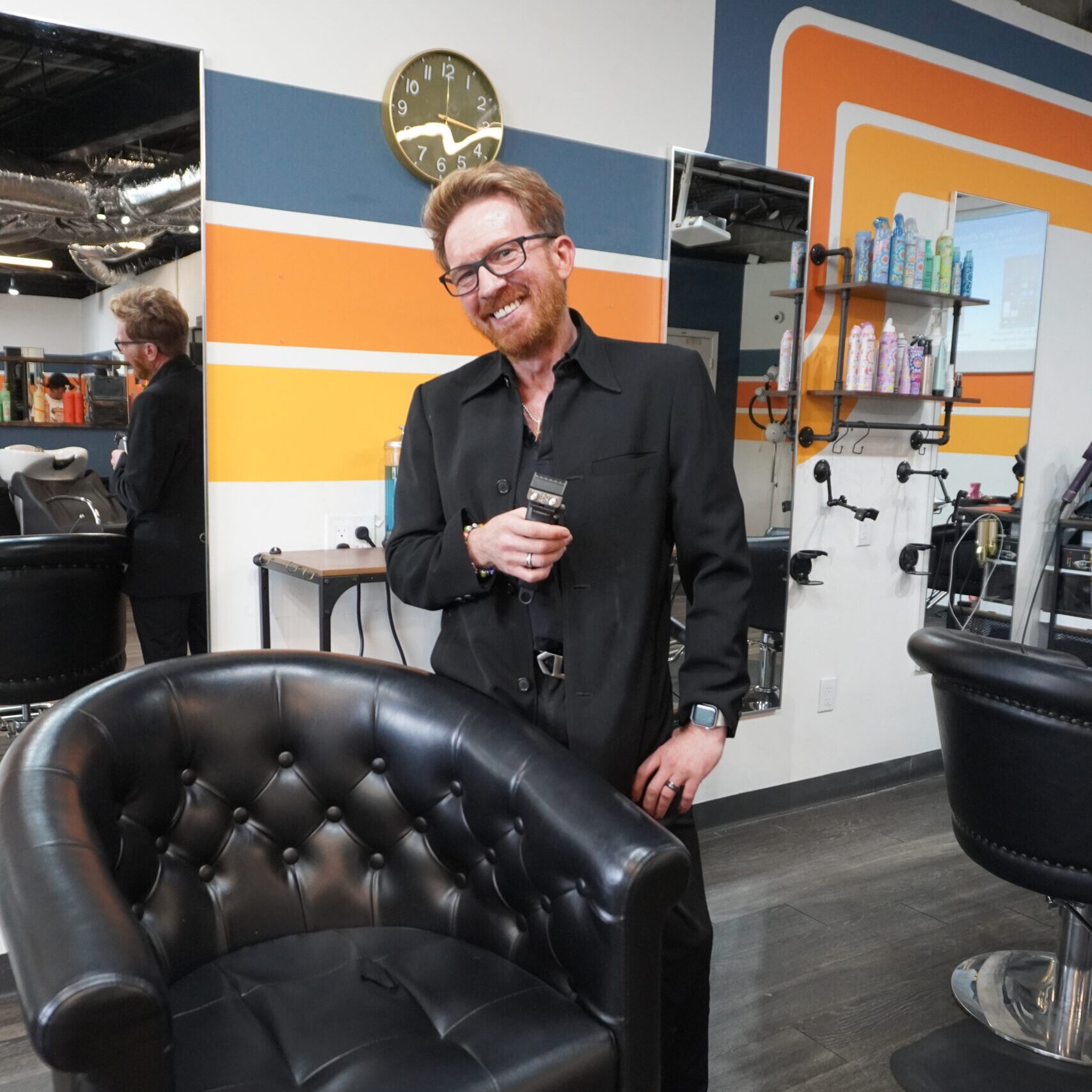 Luci, stylist at Keenan Salon in Atlanta, specializing in vivid haircolor and personalized color transformations.