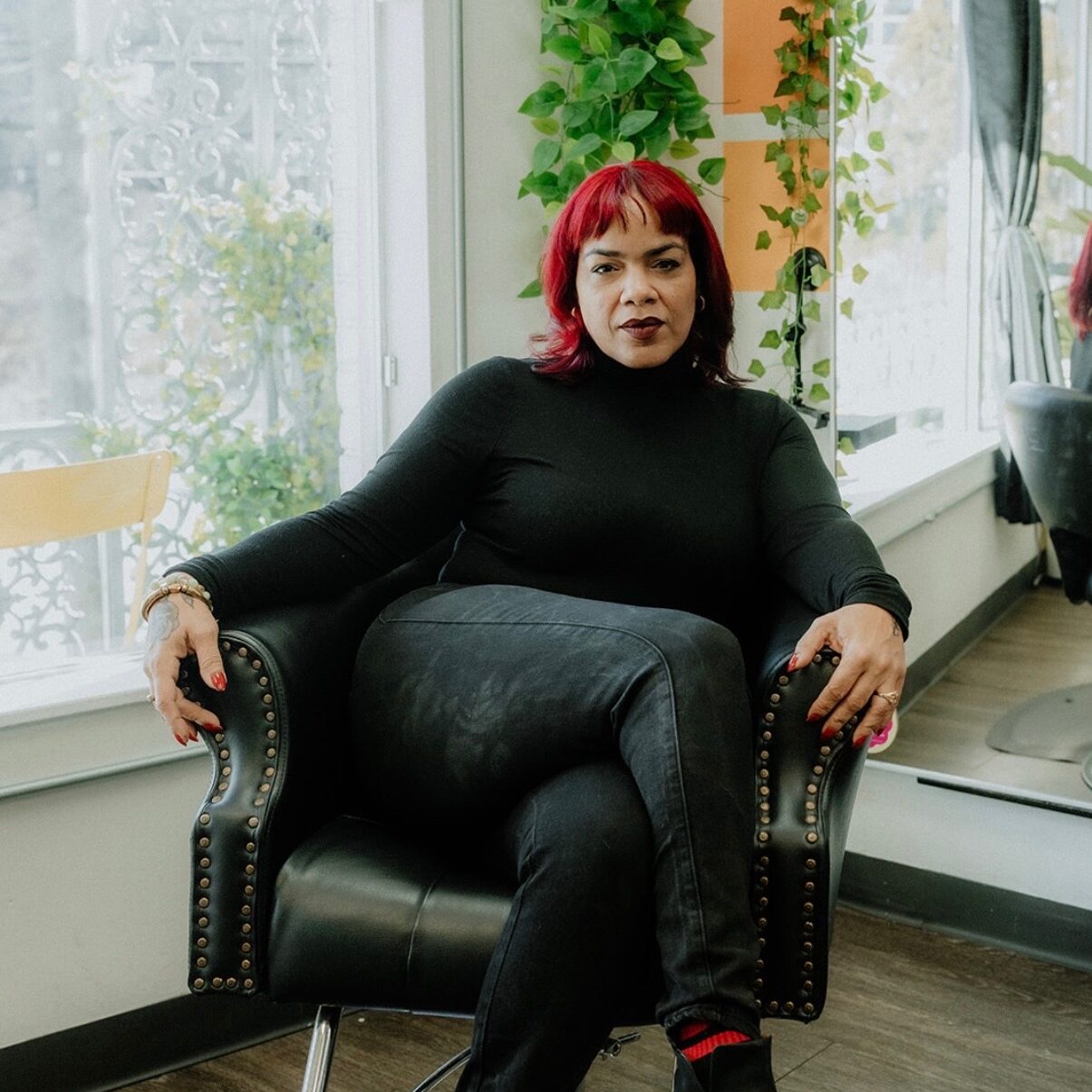 Luci, stylist at Keenan Salon in Atlanta, specializing in vivid haircolor and personalized color transformations.